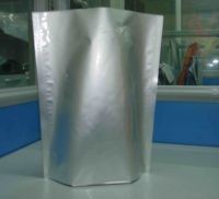 D'argento normali lucidi stanno SU la chiusura lampo d'imballaggio del sacchetto della stagnola per l'imballaggio per alimenti